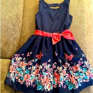 Butterflies and flowers little girls dress.